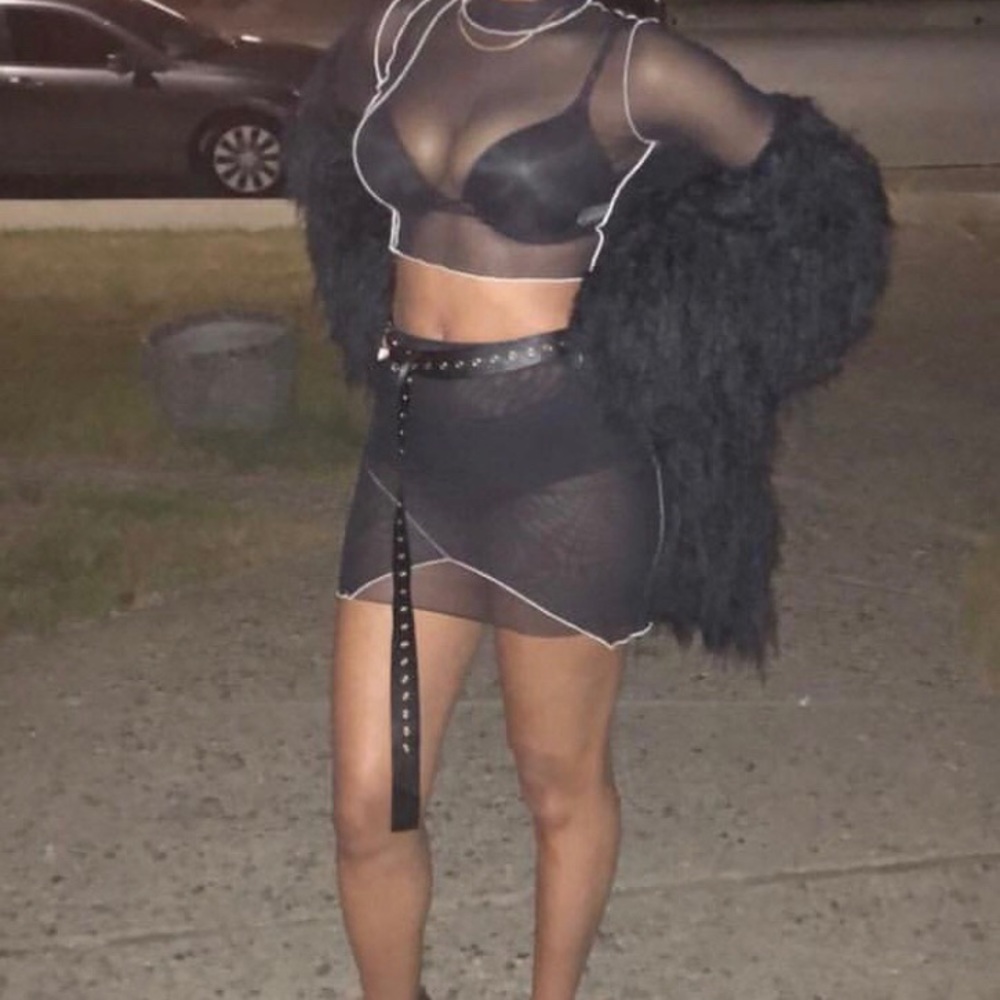 2 piece see through skirt and long sleeve top.
